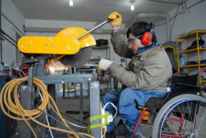 man working in shop