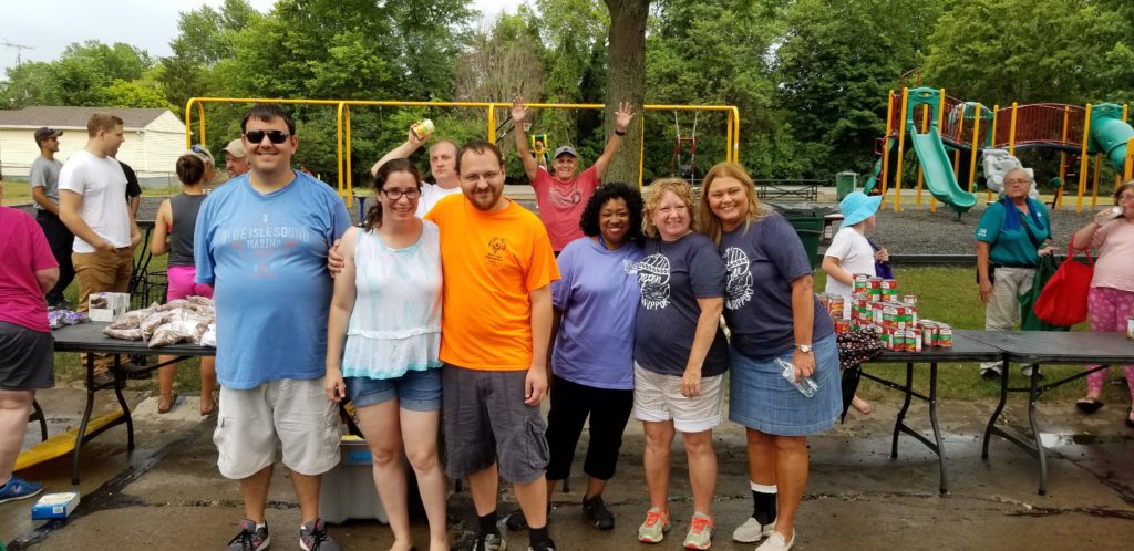 A group of people at a public event having fun