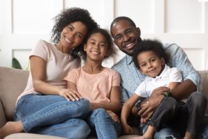 family consisting of two adults and two children