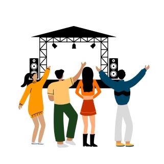 Group of people standing facing a stage and dancing along to the music